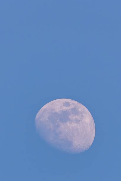istock Nice moon captured during the day few days before full-moon 682872092