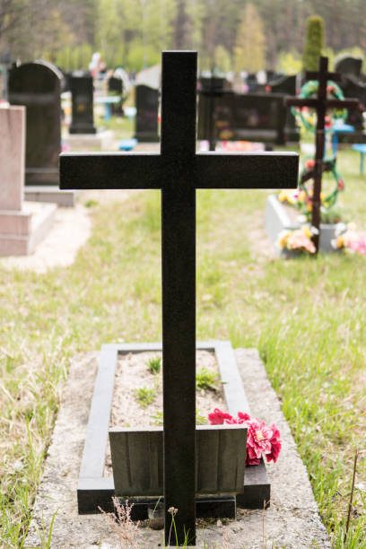 istock Marble cross over the grave 682872560