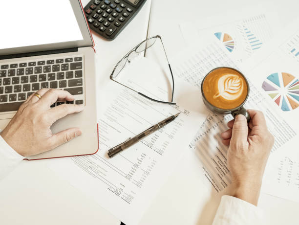 istock Businessman hold coffee cup in his hand 682873440
