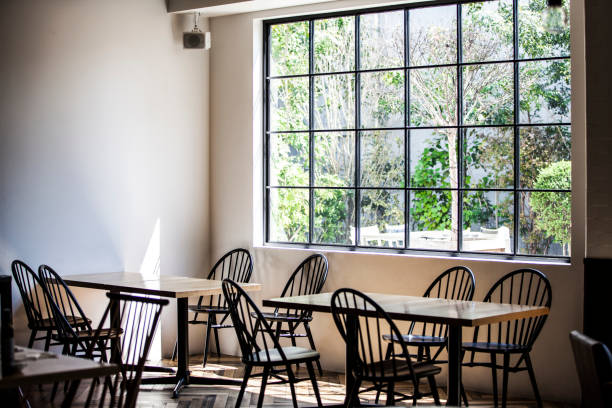 picture of a nice restaurant. The table, the knife, the fork and the napkin in the restaurant. restaurant window stock pictures, royalty-free photos & images