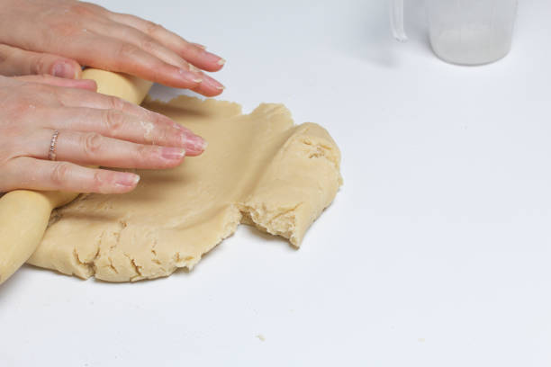 istock Pie with stuffing from cottage cheese and apple jam. Stages of preparation. 682888530
