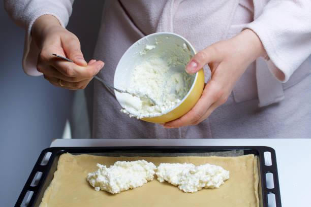 istock Pie with stuffing from cottage cheese and apple jam. Stages of preparation. 682888634