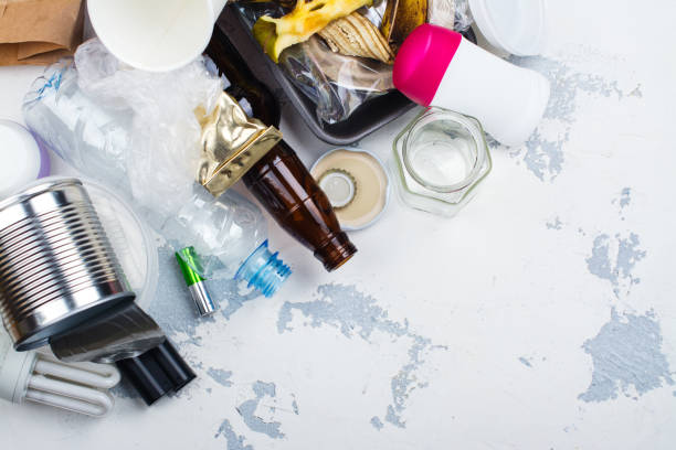 istock Pile of unsorted waste on white stone background 682896928