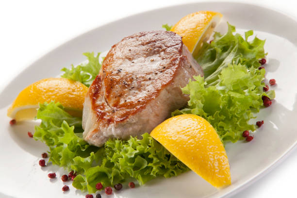 istock Fish dish - fried tuna steak and vegetables 682897756