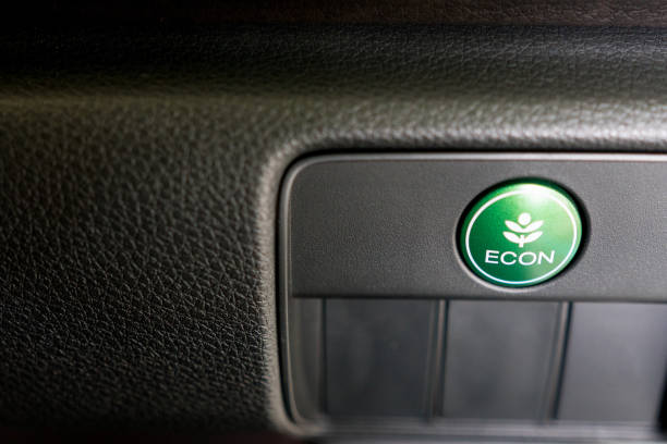 istock Close up of Eco button for energy saving in car. 682904930