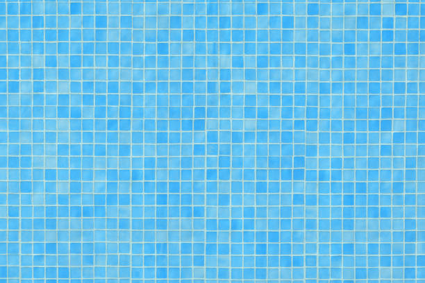 istock Blue ceramic tile mosaic in swimming pool 682912698