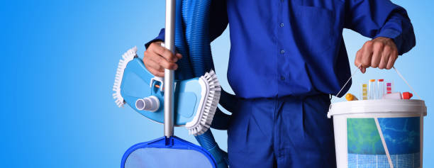 istock Concept swimming pool maintenance worker with blue background 682912702