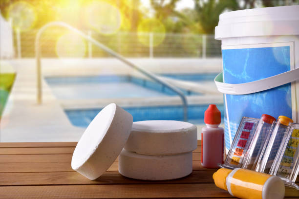 istock Swimming pool service and chemicals and pool background 682912742