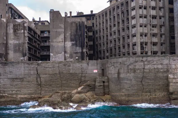 Uninhabited warship island of Japan in Nagasaki (Hashima) registered as a UNESCO World Heritage Site. Concrete is in ruins