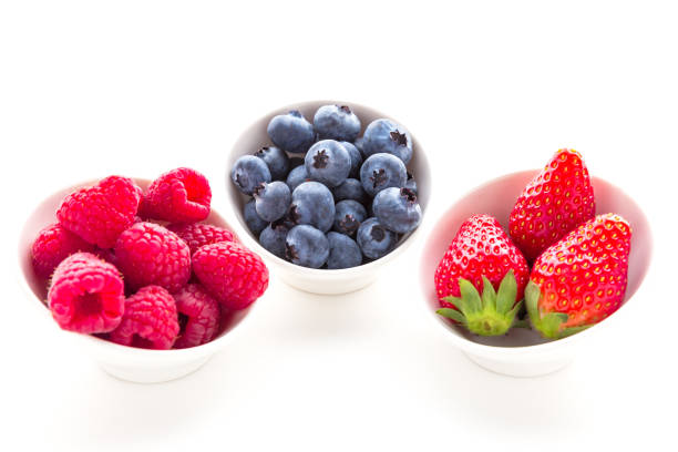 istock Bowl of berries over white 682920026