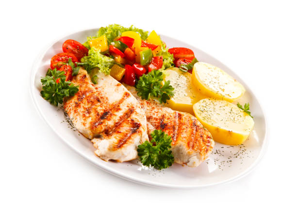 istock Grilled chicken breast and vegetables 682920800