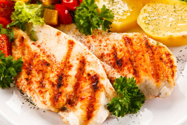 istock Grilled chicken breast and vegetables 682920888