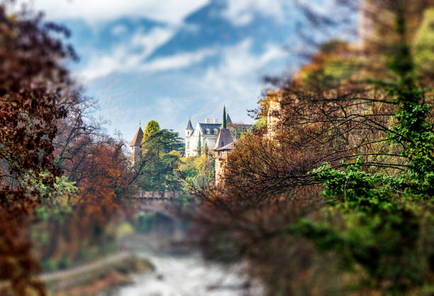 Scena Castle and the Parish Church of the Assumption of Mary (Parrocchia di Maria Assunta) in Scena near Merano, Trentino - South Tyrol, Italy.