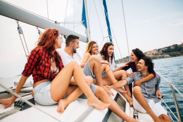 istock Happy friends on a yacht 682923594