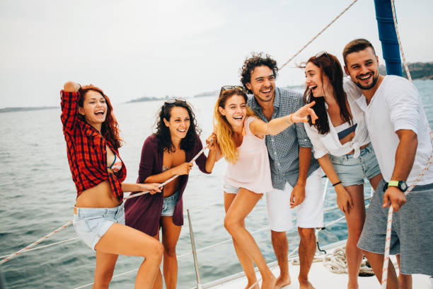 istock Happy friends on a yacht 682923762