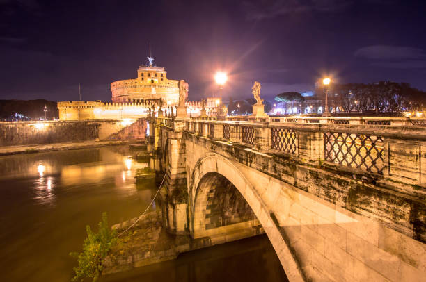 Saint Angel Castle and bridge over the Tiber river in Rome