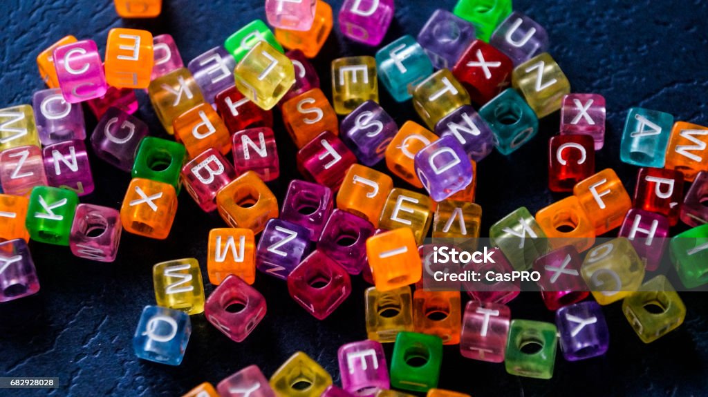 Many colorful decorative cubes with letter Many colorful decorative cubes with letter. Photo. Letter - Document Stock Photo