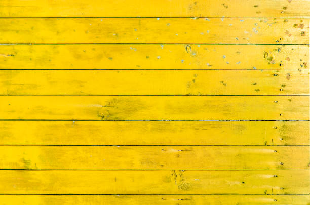 istock Yellow wooden texture close 682942858