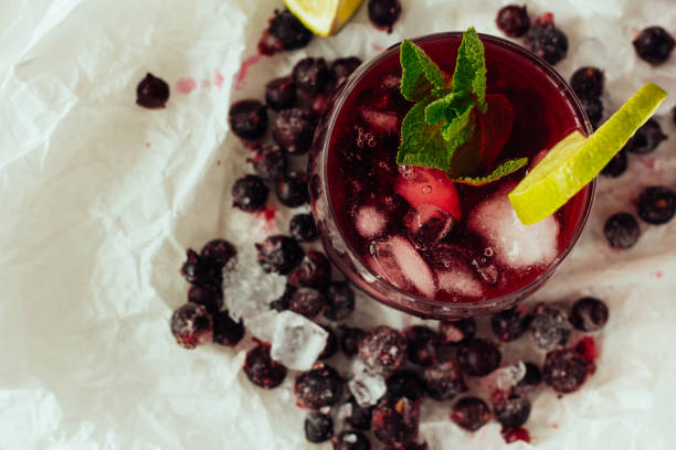 istock Berry cocktails with mint and lime in glass 682943566