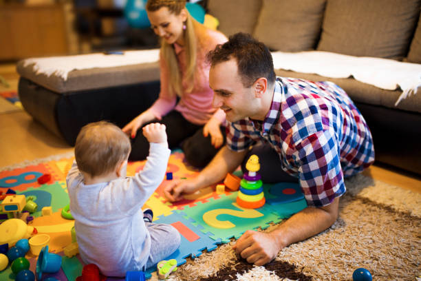 istock Happy young family at home 682951230