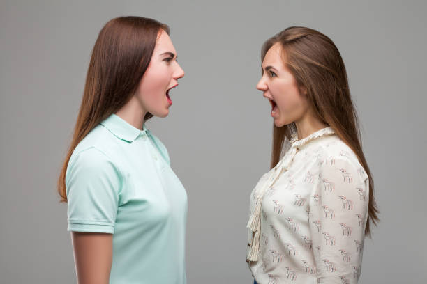 istock Girls screams at each other, studio photo shoot 682951566