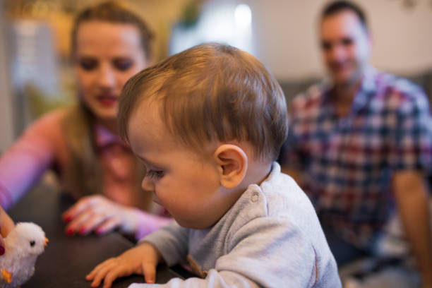 istock Baby boy with his parents 682951836