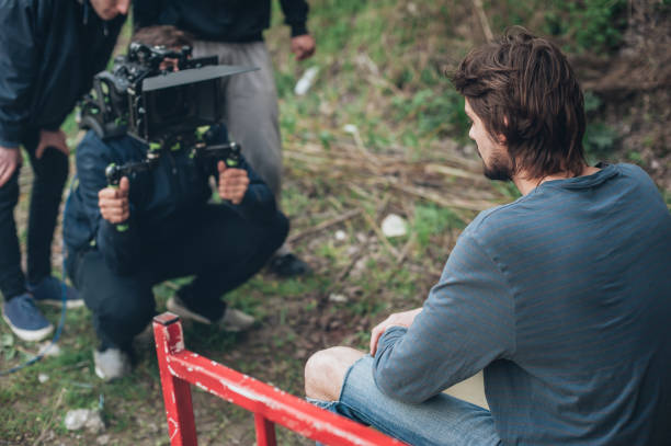istock Behind the scene. Actor in front of the camera 682954480