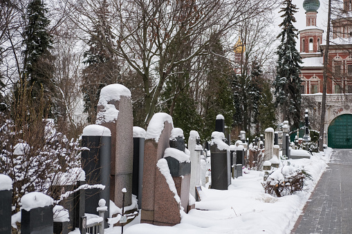 Moscow, Russia. 18 December 2016 : Novodevichy Cemetery, the most famous cemetery in Moscow, Russia. It lies next to Novodevichy Convent. Full of snow in winter.
