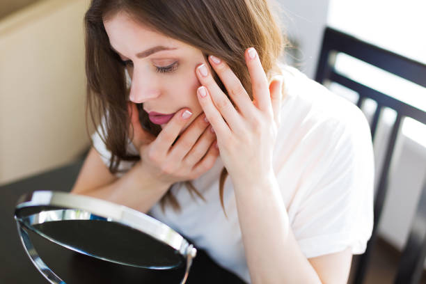 istock Woman sitting by the mirror 682964370