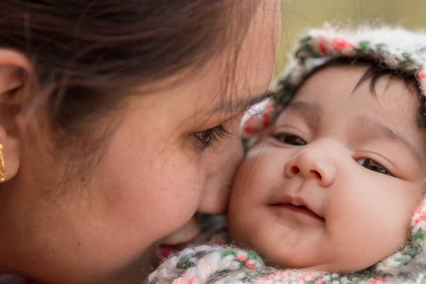 istock Mother and daughter cuddling 682965258