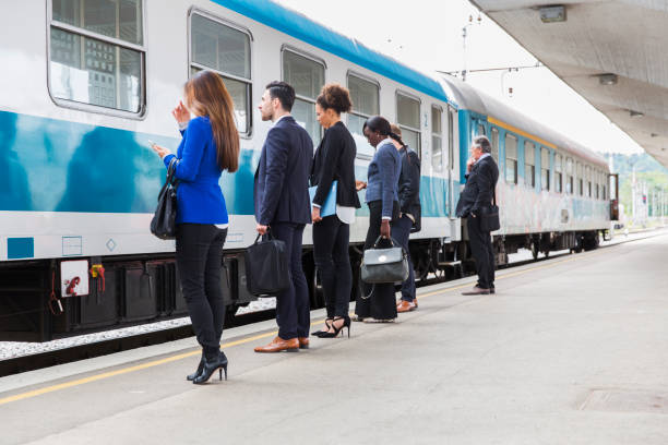 istock Business people on a railroad station waiting for train 682968696