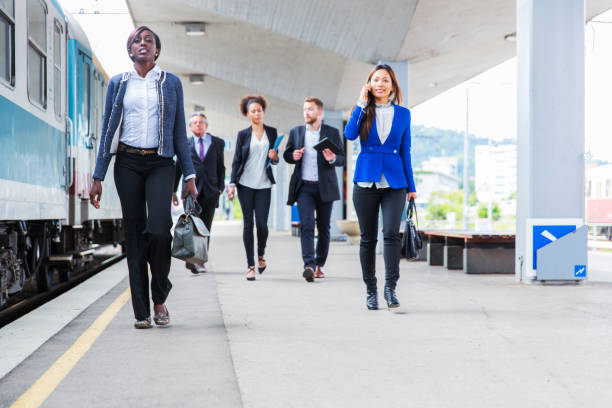 istock Business people on a railroad station waiting for train 682968748
