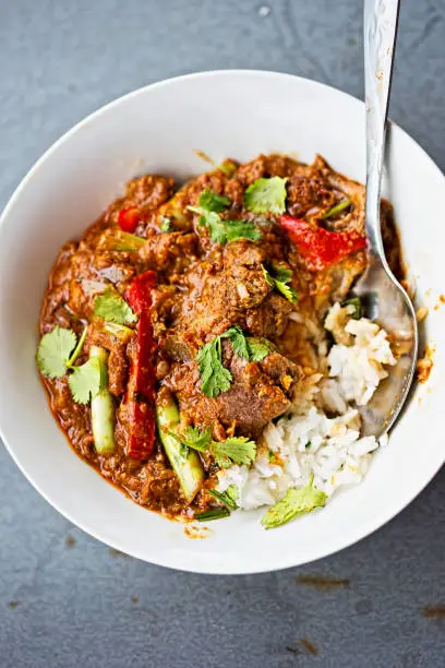 Malaysian beef curry with scallions and red peppers
