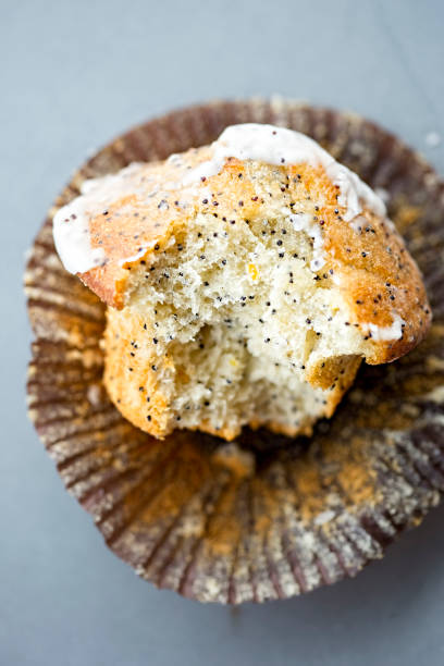 Lemon poppyseed muffin Lemon poppyseed muffin poppy seed stock pictures, royalty-free photos & images
