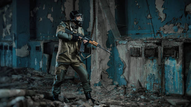 istock photo of man in uniform with a weapon 682972828