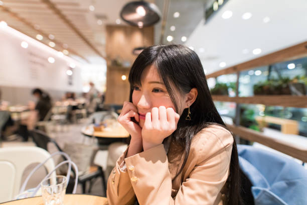 istock Young woman waiting for someone in cafe 682972974