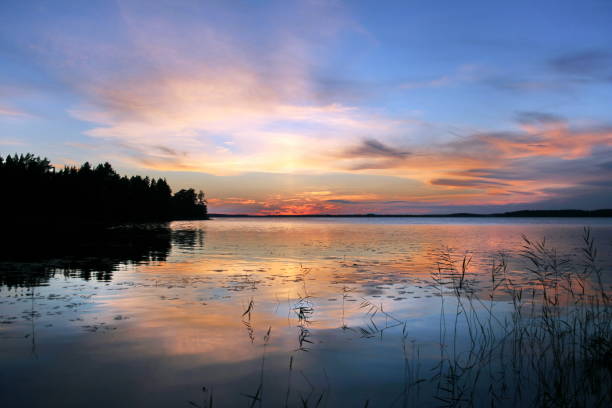 istock Beautiful sunset on lake . Karelia 682979364