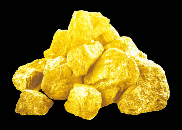 istock Gold nuggets isolated against the black background 682997100