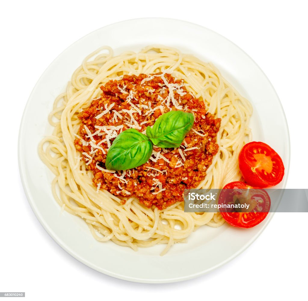 Spagetti bolognese valkoisella lautasella - Rojaltivapaa avainsanalla Annoskoko ja tyyppiä Kuvapankin valokuva