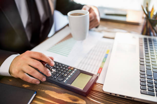 istock Businessman Working In Office And Having A Cup Of Coffee 683014632