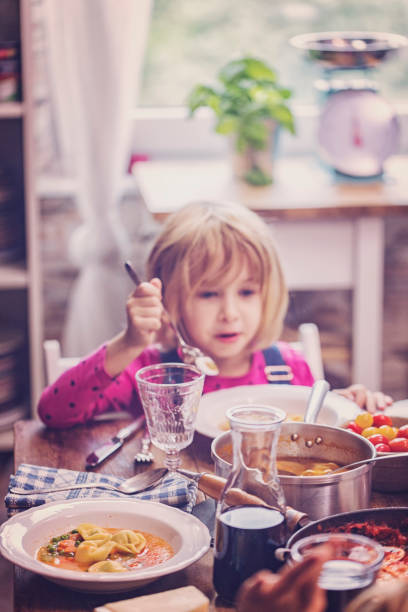 istock Eating Ravioli with Tomato and Tortellini Soup 683018134