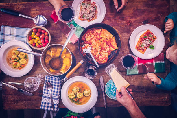 istock Eating Ravioli with Tomato and Tortellini Soup 683018312