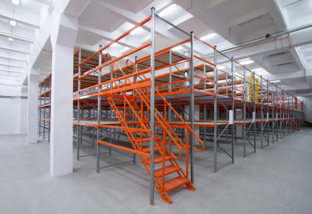 istock Shelving mezzanine system. Empty metal racks in a large modern warehouse. 683024144