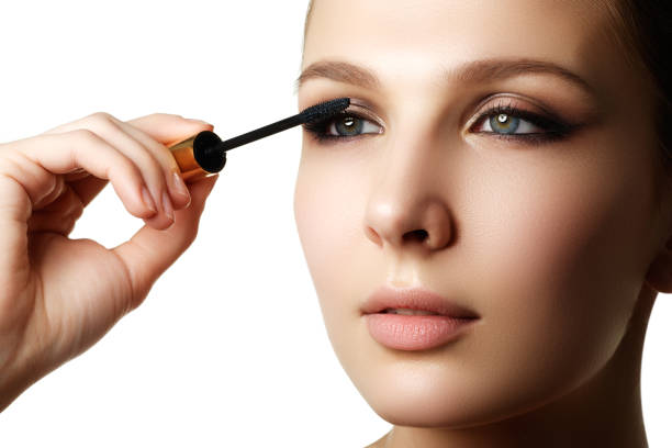 istock Mascara applying closeup, long lashes. Mascara brush. Eyelashes 683035168
