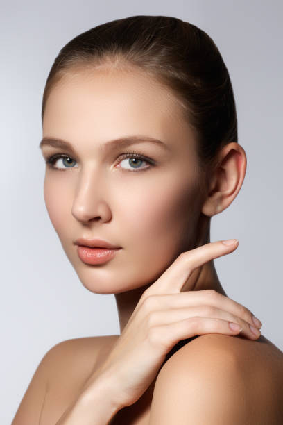 istock Beauty portrait. Beautiful spa woman touching her face 683035222
