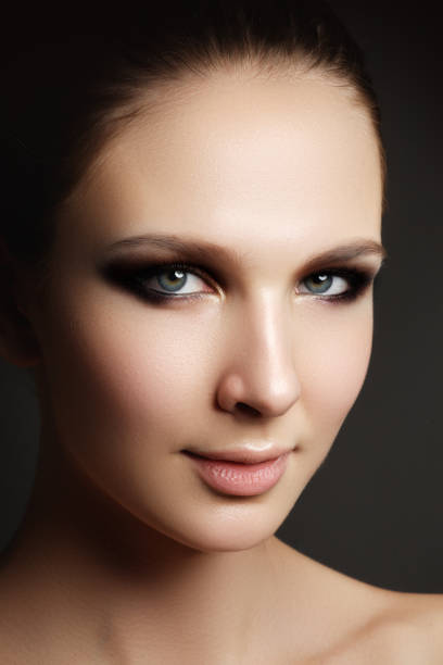 istock Beautiful woman with bright make up eye with sexy liner makeup. 683035690