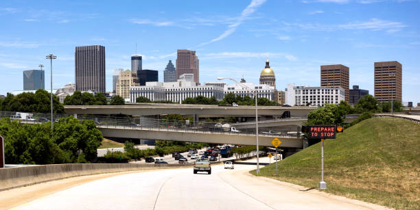 istock Car Entering Highway Rush Hour Downtown Atlanta Georgia City Skyline 683044390