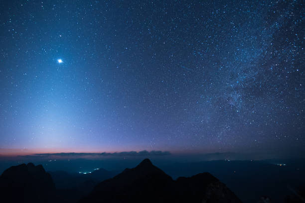 istock starry night and milky way in the clear night sky 683051836