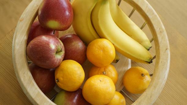 istock Apples, Bananas and Satsumas in Fruit Bowl. 683054910