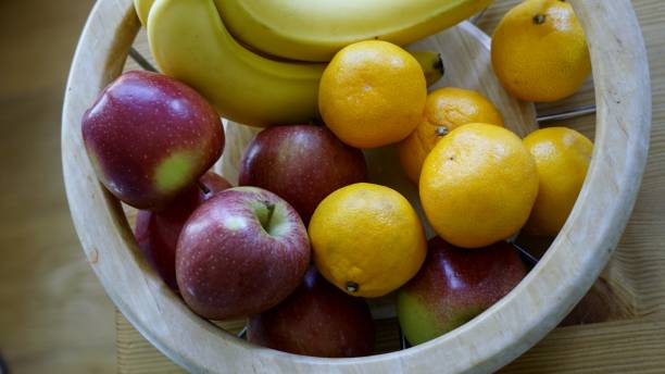 istock Apples, Bananas and Satsumas in Fruit Bowl. 683054914
